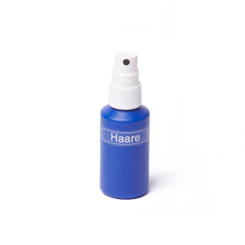 Kleine blaue Flasche Haare